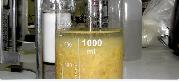 Powdered ion exchange resin for condensate filtration